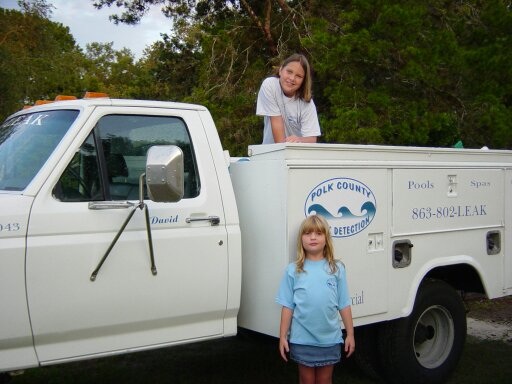 Polk County Leak Detection truck with daughters